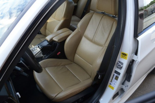 Illustration for article titled A 2011 automatic white sedan with a beige interior is what I should have gotten as my DD